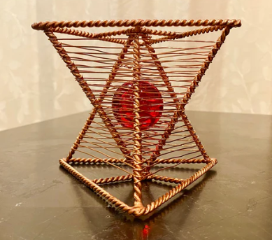 Tetra Coil - Scalar Broadcasting Dock copper with red crystal sphere in the middle 