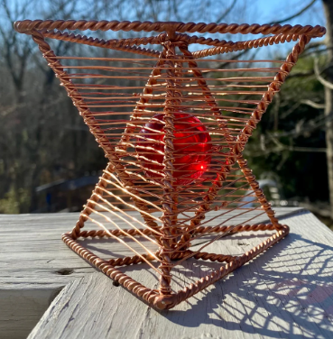Tetra Coil - Scalar Broadcasting Dock outside - copper wire sacred geometry sculpture with red crystal sphere in center