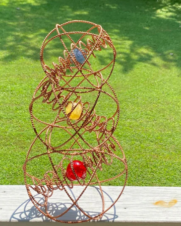 Stacked copper Omnicore tower with crystal spheres 